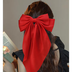 VELSCRUN bow in hair half-up style demonstrating secure, polished look