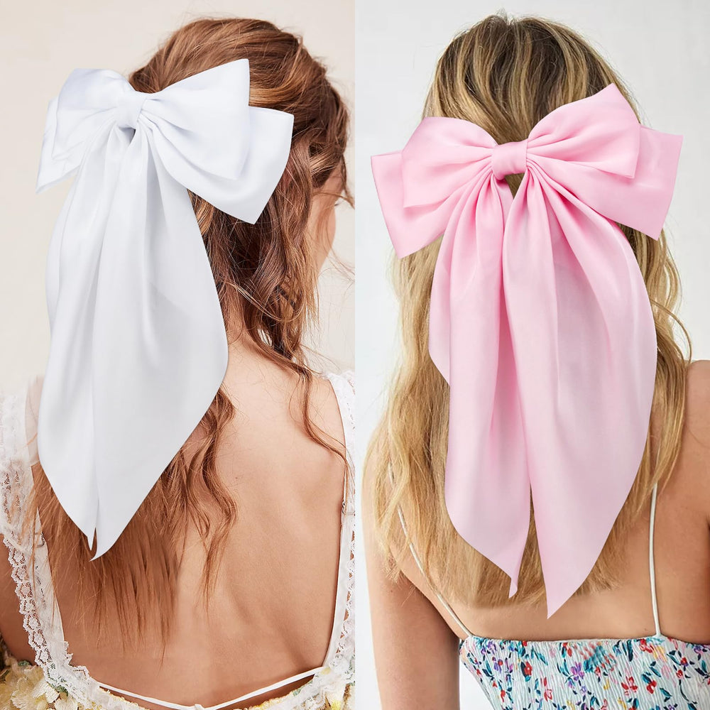 VELSCRUN hand holding bow to show 8x13.5 inch size and wearable scale