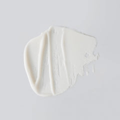 Versed Day Maker creamy microcrystal texture close-up highlighting gentle polish action
