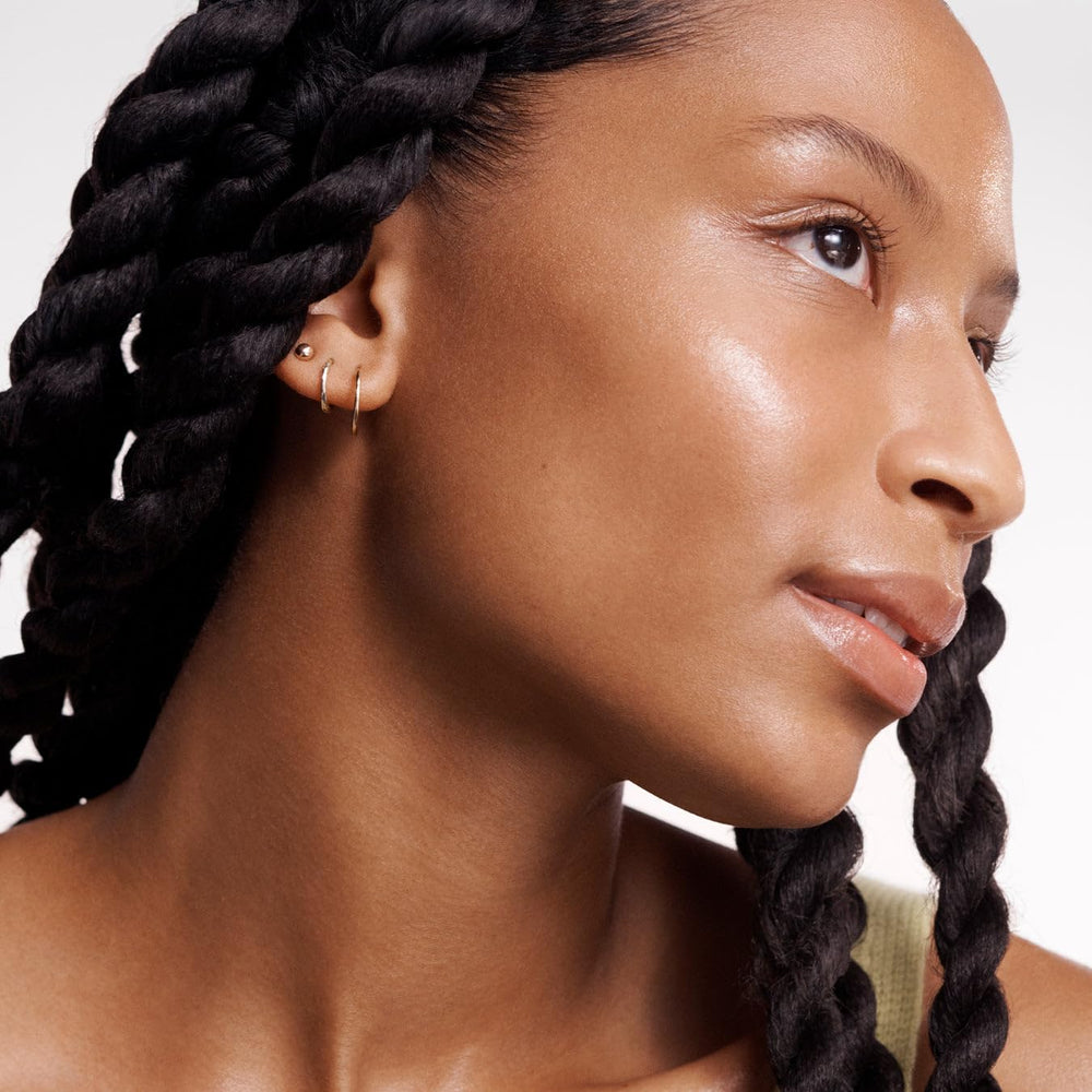 Versed label closeup showing ingredient list and clean-beauty transparency