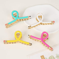 Vigorpace pencil clip securing an updo on thick hair, comfortable all-day wear