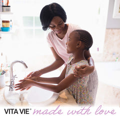 VITA VIE in-use on hands at kitchen sink offering refreshing clean