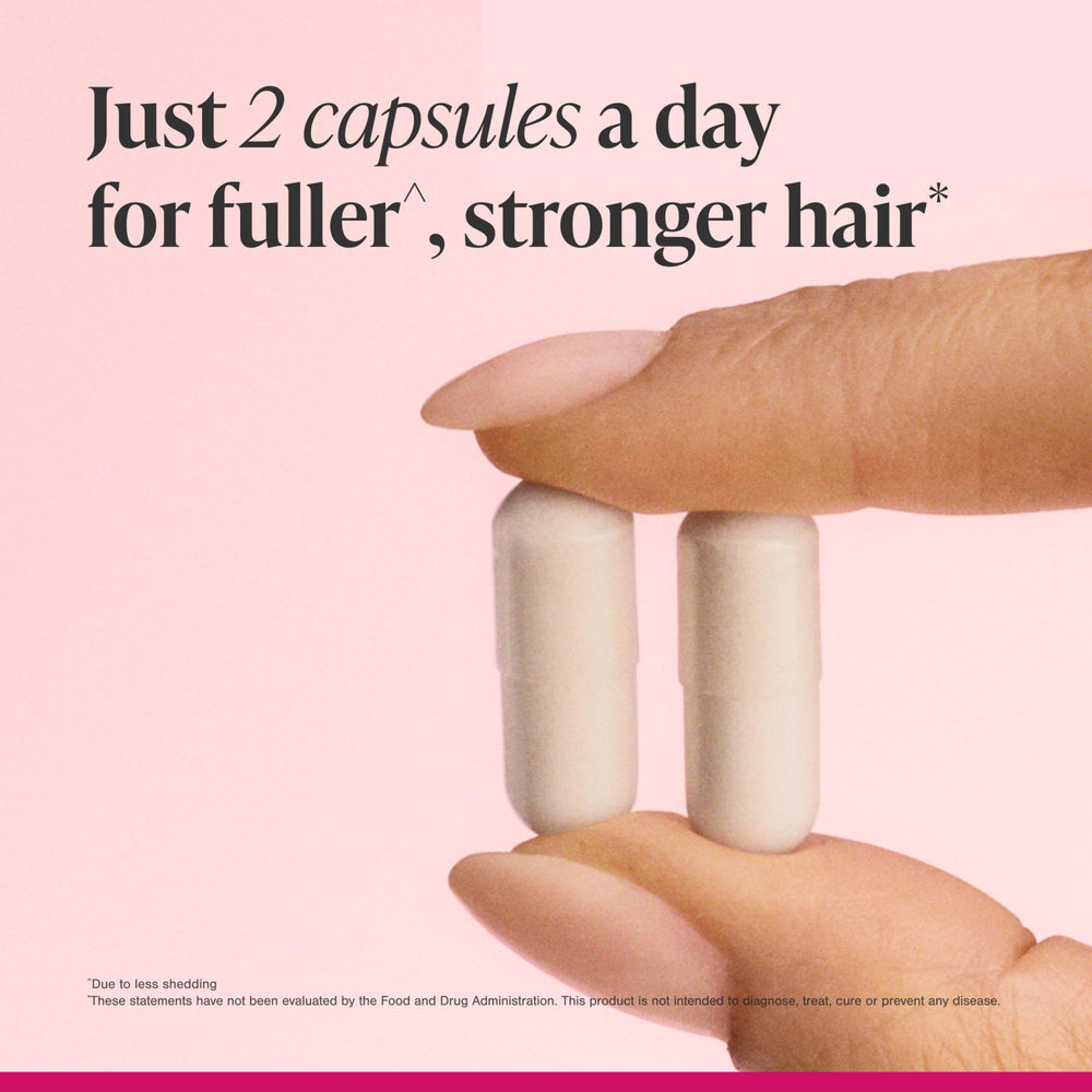 Viviscal tablets next to bottle illustrating count and monthly supply