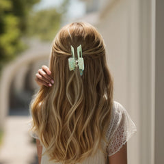 VOCOSTE side profile open jaw reveals wide clamp for thicker hair