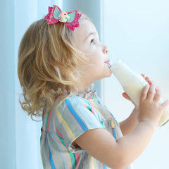 volepet bow next to ruler showing 3-inch size for toddlers