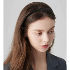 Vovii headband next to ruler showing slim scale and easy portability