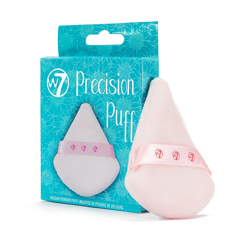 W7 application lifestyle image demonstrating powder and puff creating matte, camera-ready skin