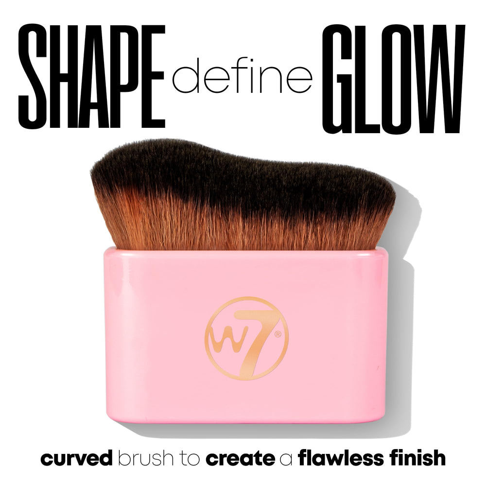 W7 swatch on hand demonstrating buildable bronzed tint