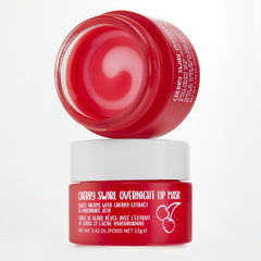 W7 glossy lip balm on hand demonstrating instant shine and conditioning