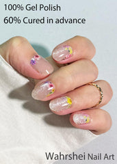Wahrshei applying gel sticker on nail demonstrating easy DIY