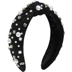 WantGor pearl headband front view showing elegant black band and embellishments for refined styling