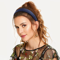 WantGor headband held in hand to show true size and portability