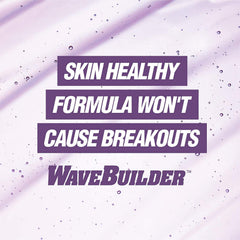 Applying WAVEBUILDER pomade while brushing to form deep, defined waves