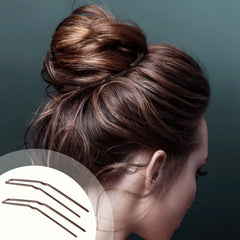 Waydress securing a bun in use, demonstrating strong hold and tidy finish benefit
