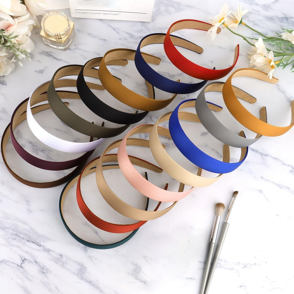 Wecoe headbands flatlay paired with outfit pieces to inspire styling ideas