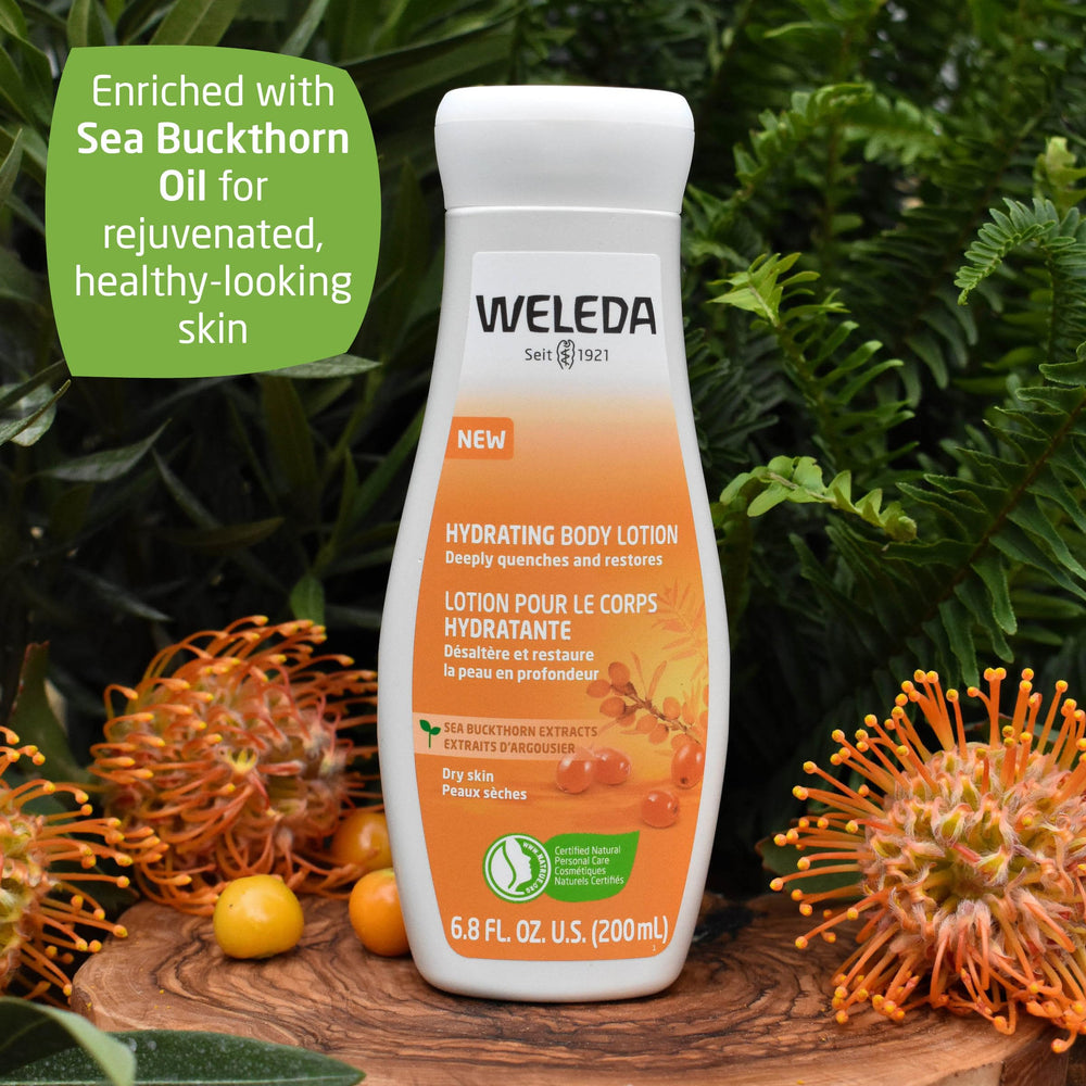 Weleda size comparison with hand illustrating 6.8 fl oz portable, travel-friendly bottle