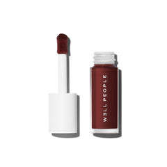 Well People front packaging showing Dewy Iris shade and glossy finish benefit