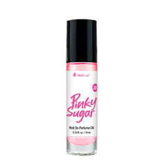 Applying Well's Oil Pinky Sugar to wrist at pulse point for lasting localized fragrance