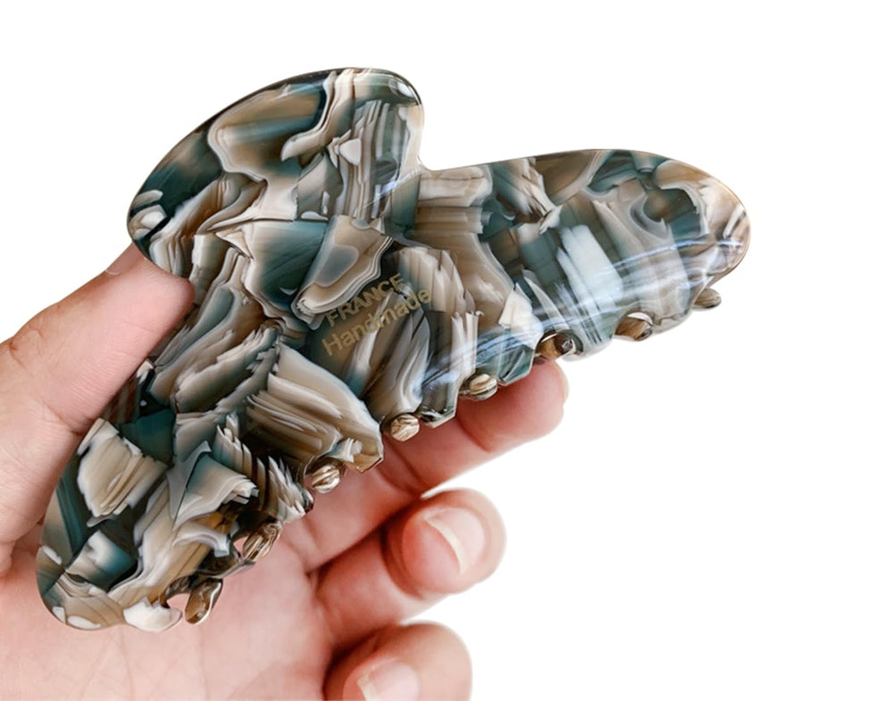 Wenlly hair claw in use securing a half-up style for everyday convenience