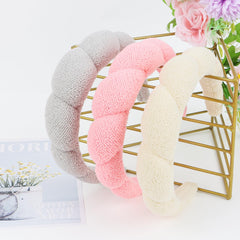 WHAVEL headbands styled on bathroom shelf suggesting lifestyle organization
