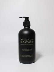 Whiskey and Leather front bottle view showing label and 15.7 oz capacity benefit