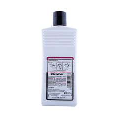 Wild Root applying conditioner to scalp and hair demonstrating flake-reduction benefit