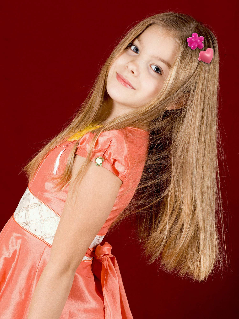 WILLBOND barrettes in a girl's hair creating cute, tidy styles for everyday wear