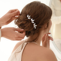 WILLBOND hair pins placed in a bridal updo adding visible sparkle and finishing touch