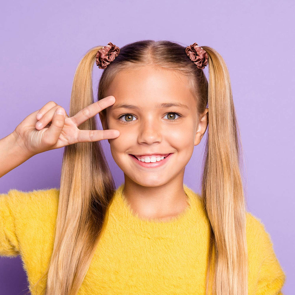 WILLBOND stacked scrunchies on wrist as decorative accessory and storage idea