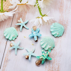 WILLBOND starfish clip detail with pearl accent, enhancing bridal or party hairstyles