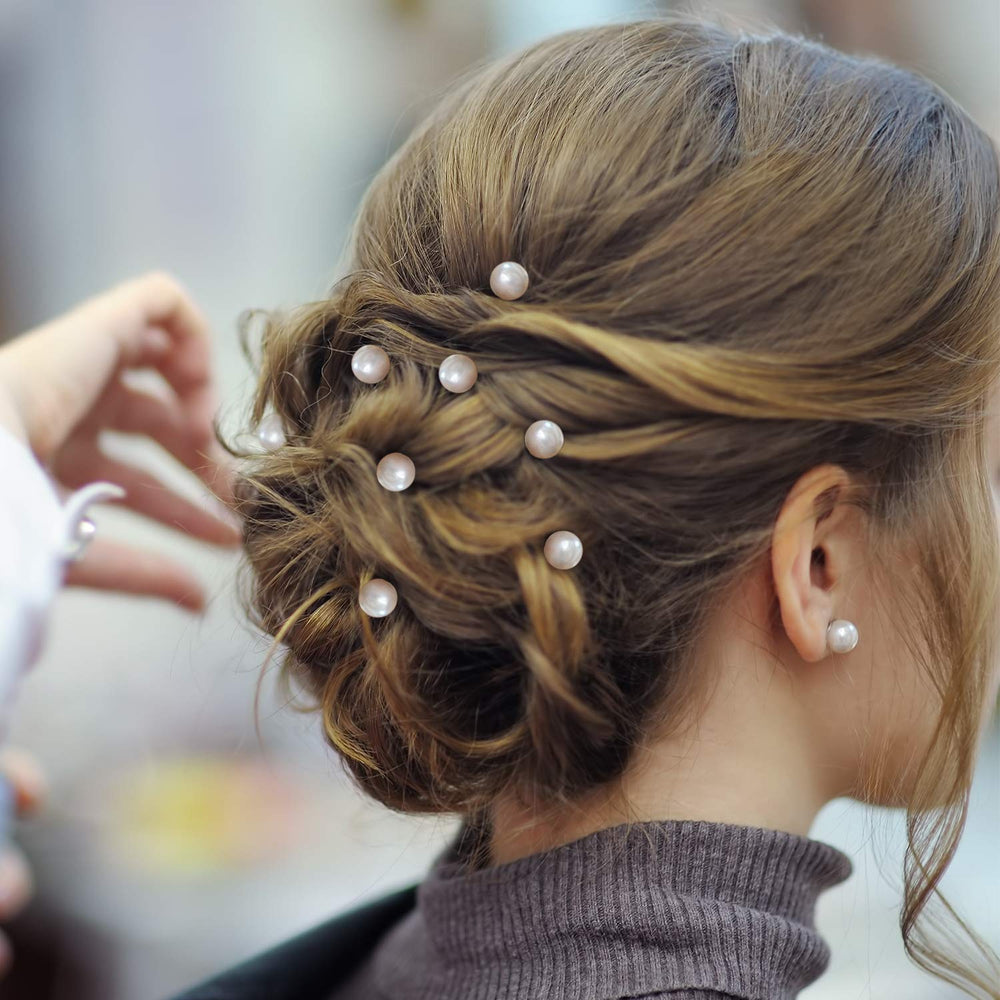 WILLBOND styled bridal updo with pearls adding refined decoration