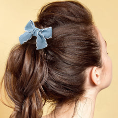 Winsyison bow clip worn in half-up hairstyle demonstrating style boost and comfortable hold