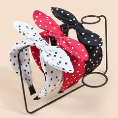 WJYX BOWS size comparison beside a ruler illustrating one-size-flexible fit