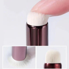 WOKOTO brush held in hand to show size and control during application