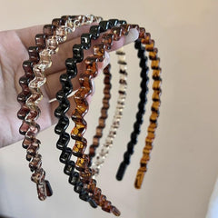 WOVOWOVO front packaging showing four color headbands and benefits