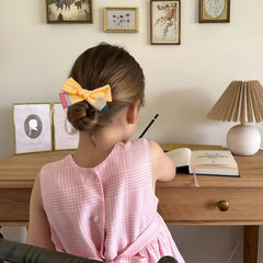 WOVOWOVO fabric-wrapped clip back view protecting hair and scalp