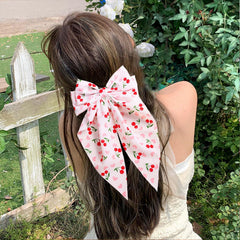 WRBAJIS cherry bow half-up hairstyle demonstrates romantic, wearable look