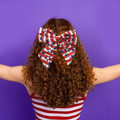 WUIIOE bow next to ruler demonstrating 13 by 6 inch size benefit