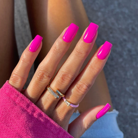 XCREANDO front packaging showing 24 hot pink press-on nails and box benefits