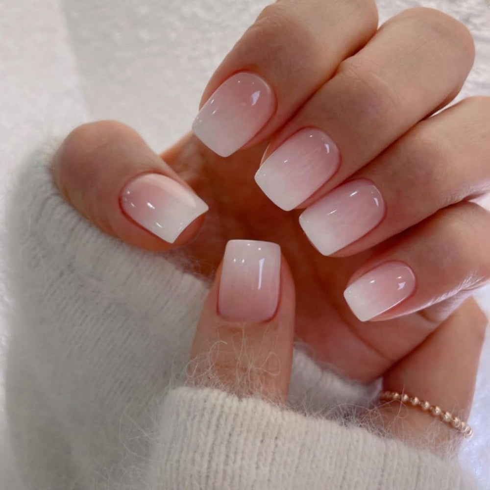 XCREANDO front view of ombre pink short square nails showing polished finish and convenience