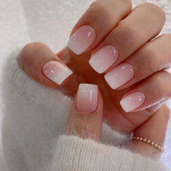 XCREANDO front view of ombre pink short square nails showing polished finish and convenience