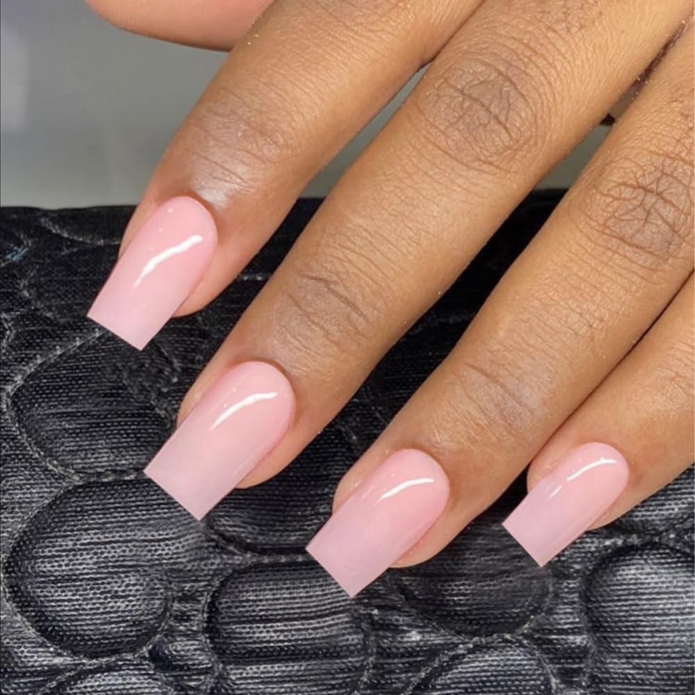 XCREANDO nail surface showing smooth solid pink finish for natural look