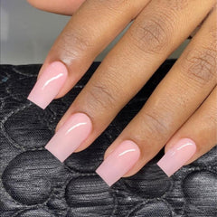 XCREANDO nail surface showing smooth solid pink finish for natural look