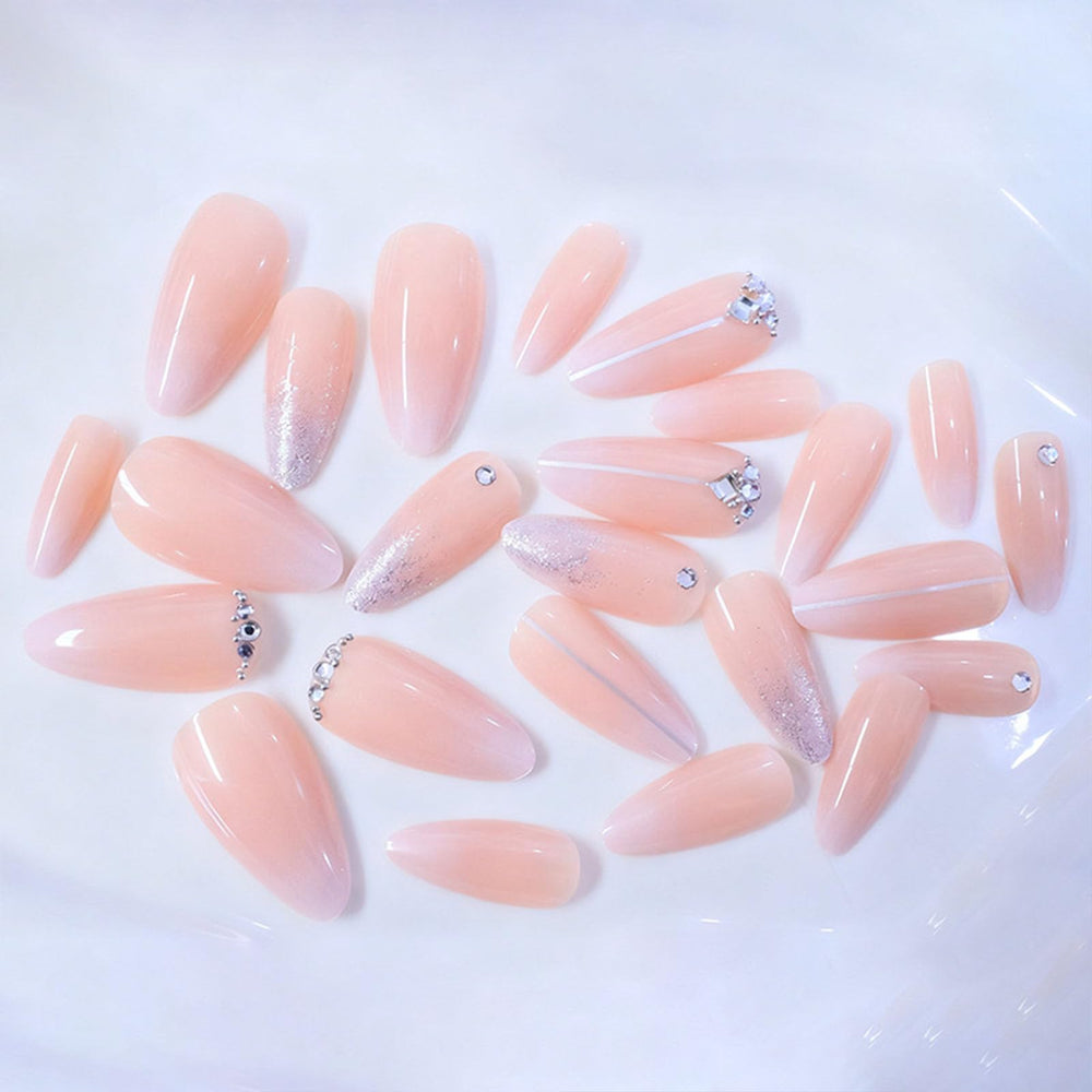 Xenophoer swatch of almond profile on nail tip, demonstrates shape and natural finish benefits