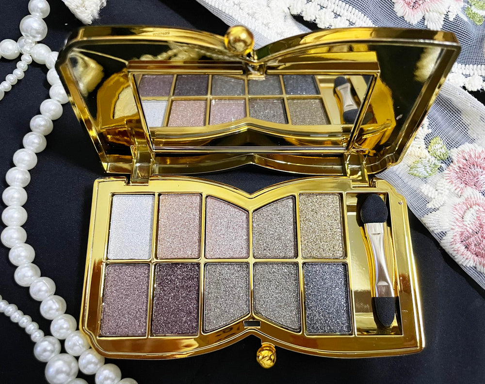 XFEXM open compact with mirror displaying full shade selection for travel convenience
