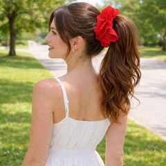 Xicer scrunchie worn on wrist as an accessory adding color and texture