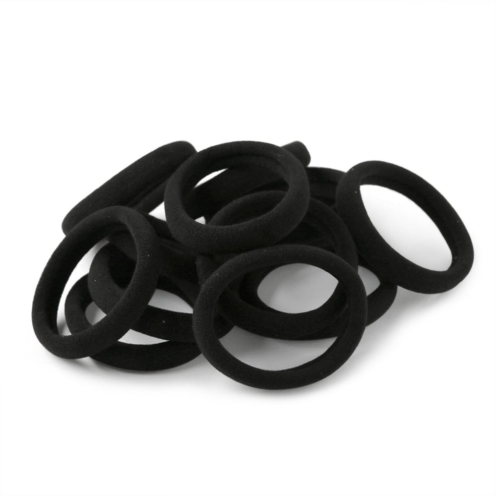 XIMA front packaging showing 60 black hair ties with compact benefit