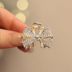 Xiwstar clipped in hair half-up style, provides subtle decorative hold