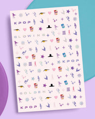xo, Fetti stickers with tweezers and top coat demonstrating easy application
