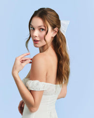xo, Fetti bow worn in half-up hairstyle adding romantic movement